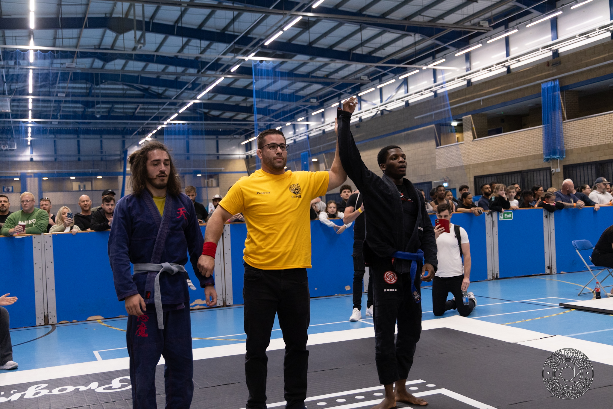 Sheyin's hand being raised after a Brazilian Jiu-Jitsu fight victory
